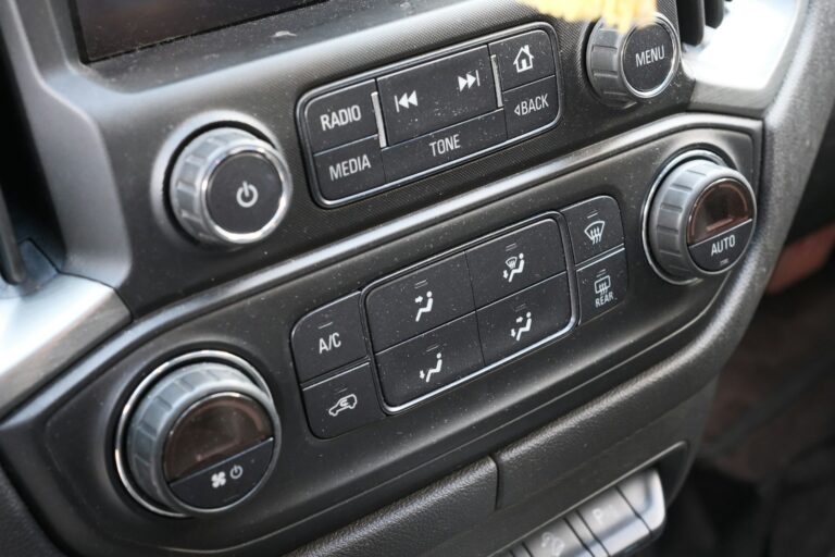 Interior dashboard climate controls parked driveway winter preconditioning