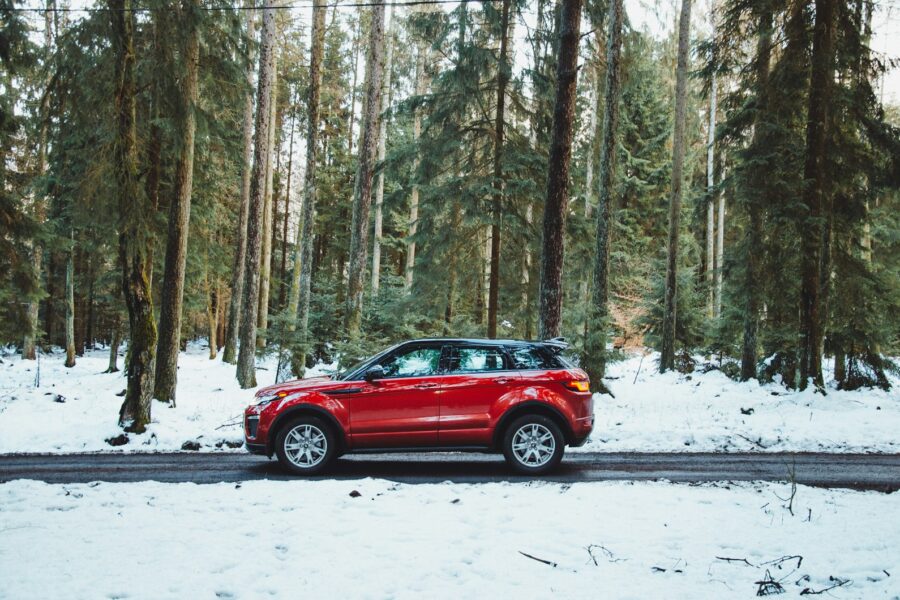 Electric car winter road snow heat pump
