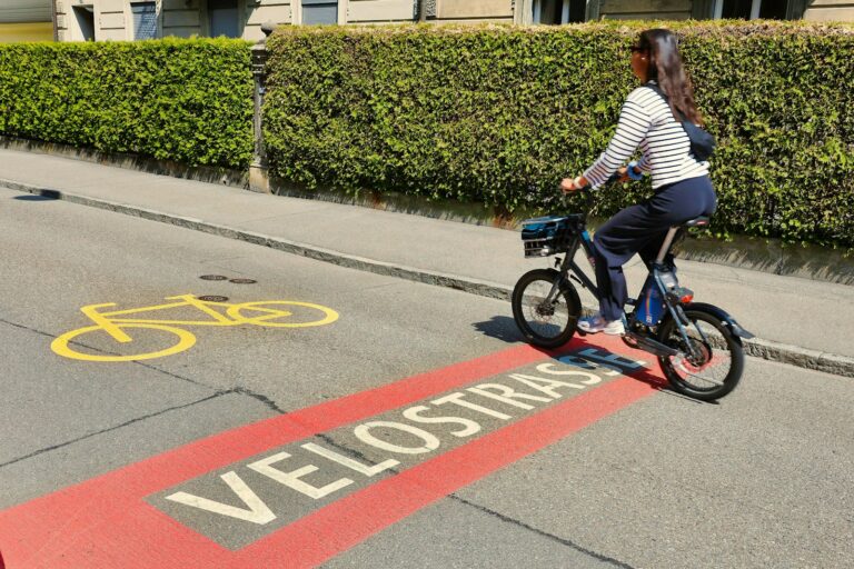 Electric scooter rider bike lane