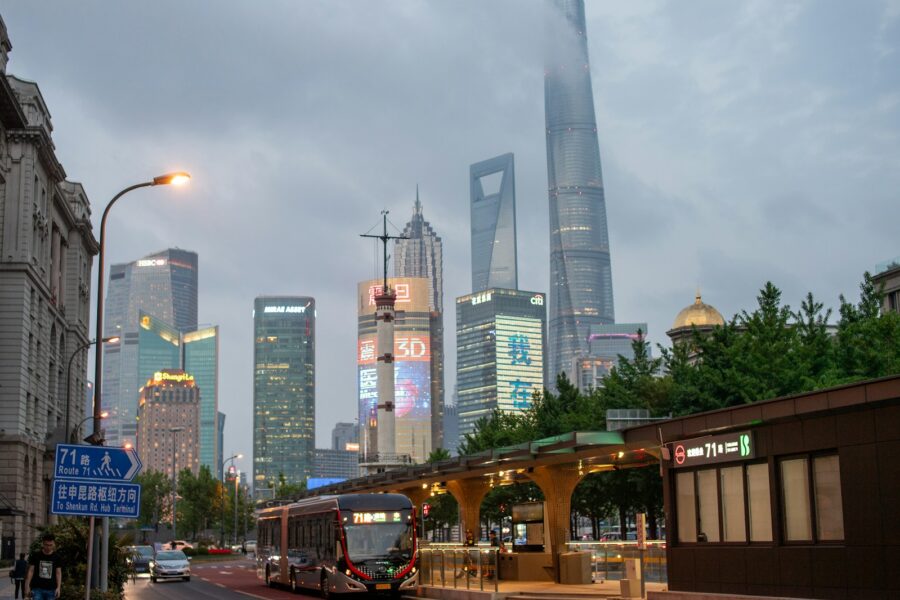 Electric cars parking lot china city skyline