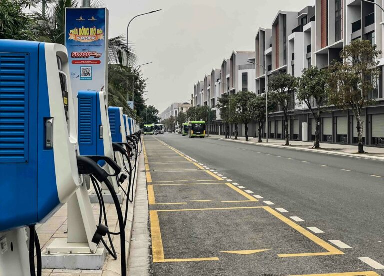 Compact electric car city street charging station