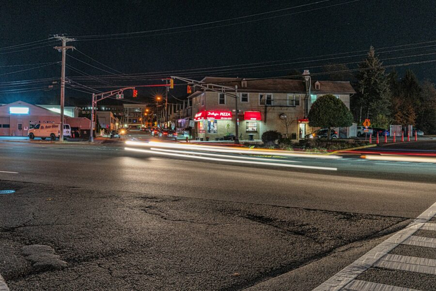 Intersection traffic lights night cars long exposure
