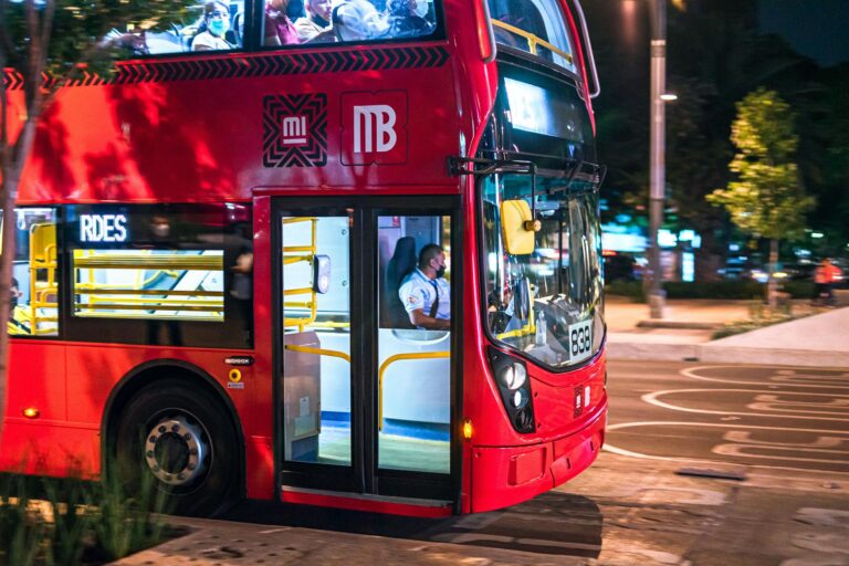 Self driving shuttle passengers autonomous shuttle bus stop