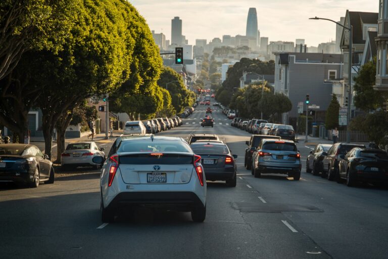 Electric car driver city traffic electric vehicle descending