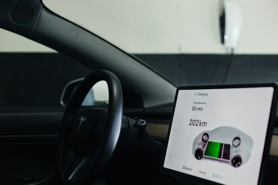 Electric car warranty paperwork dashboard pen
