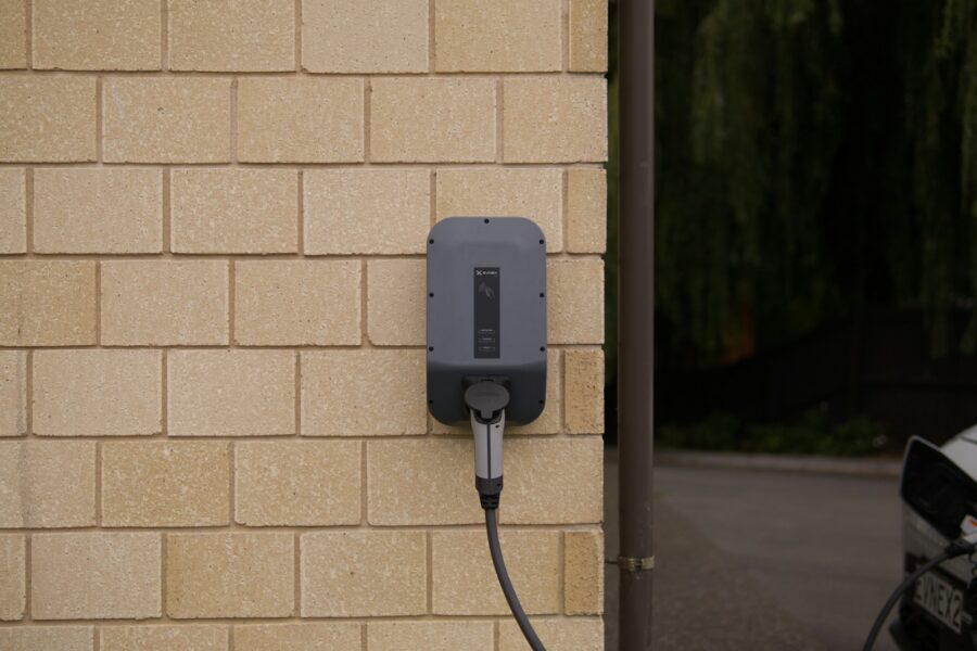 Electric car smart charger home garage night