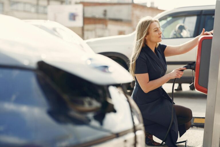 Driver using public charging station charging connector cable