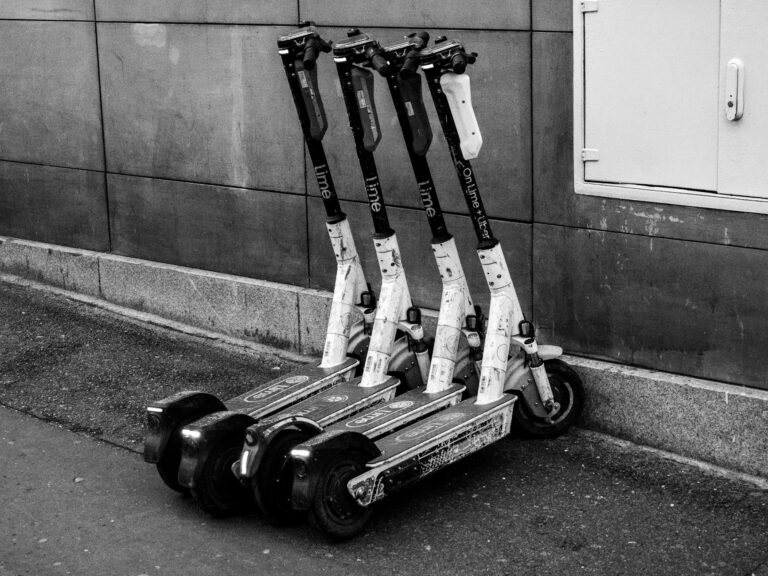 Marked scooter corral sidewalk shared scooters parked near