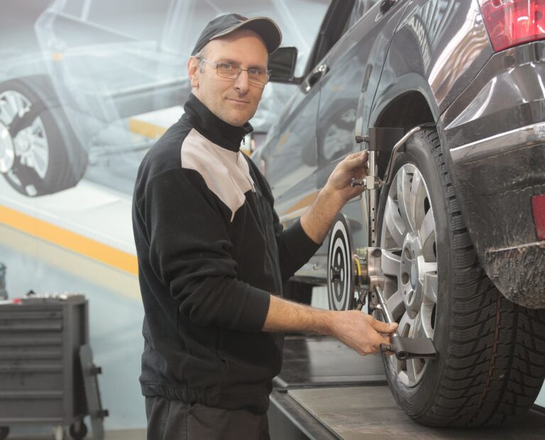 Mechanic checking car