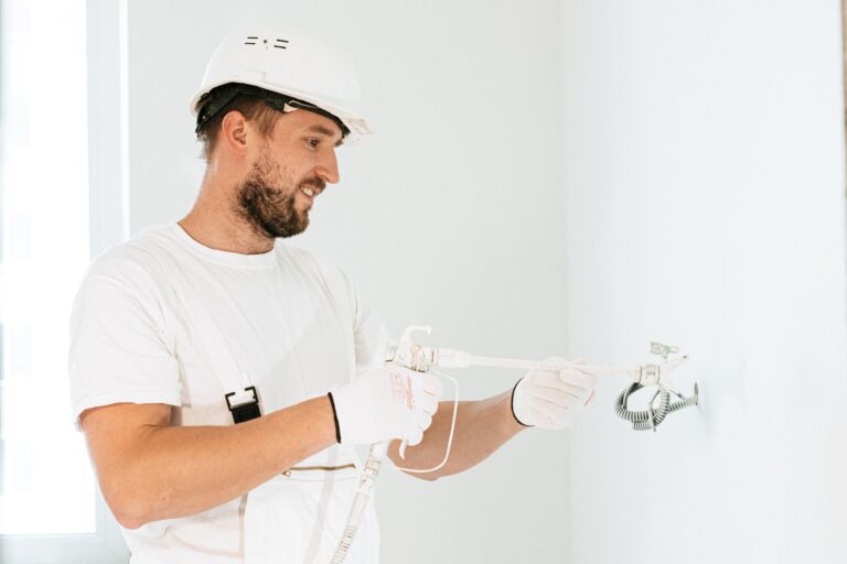 Electrician installing wall